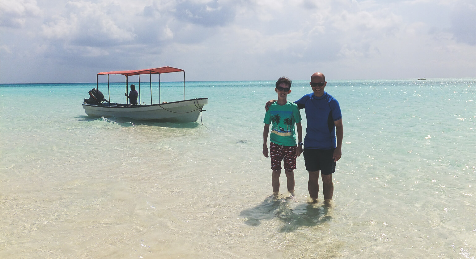My son Miles and I in the sea, Zanzibar - 2018