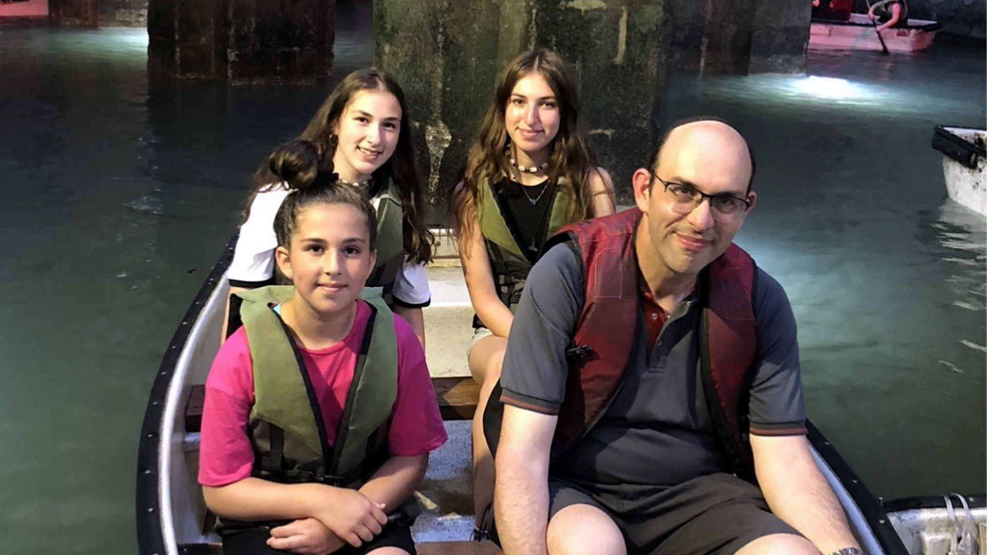 Jeffrey with his three daughters, Abigail, Eliana and Leah in The Arches Pool, Ramla, Israel.